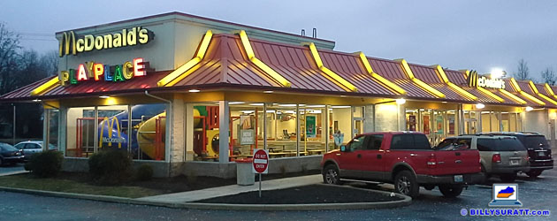 Vehicles line up outside a McDonald's fast food restaurant franchise on Thursday, Jan. 13, 2015 in Lexington, Ky. (© 2015 Billy Suratt/BillySuratt.com)