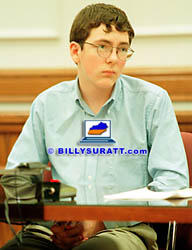 During his formal sentencing hearing in McCracken Circuit Court on Wednesday, Dec. 16, 1998 in Paducah, Ky., confessed murderer Michael Carneal's cheeks turned red as he looked up at Steve Matthew Keene who had been standing in the hallway of Heath High School when Carneal went on a shooting rampage and killed three teenaged girls on Dec. 1, 1997. Carneal had kept his head down during the entire hearing until Keene demanded Carneal look at him while he recounted events surrounding the shooting and asked the court to impose on Carneal the maximum sentence allowed by Kentucky law, life imprisonment without possibility of parole for 25 years. (Apex MediaWire Photo by Billy Suratt)