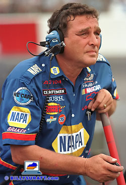 Engine builder David Vaseleniuck uses a stopwatch to clock Ron Hornaday Jr.'s NAPA Brakes Chevrolet during the 1998 Kroger 225 NASCAR Craftsman Truck Series race at Louisville Motor Speedway. Vaseleniuck's engine building skills helped Hornaday achieve six pole positions, seven wins and the 1998 Craftsman Truck Series points championship. (Copyright 1998 Billy Suratt)